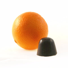 Bonbon with orange for scale
